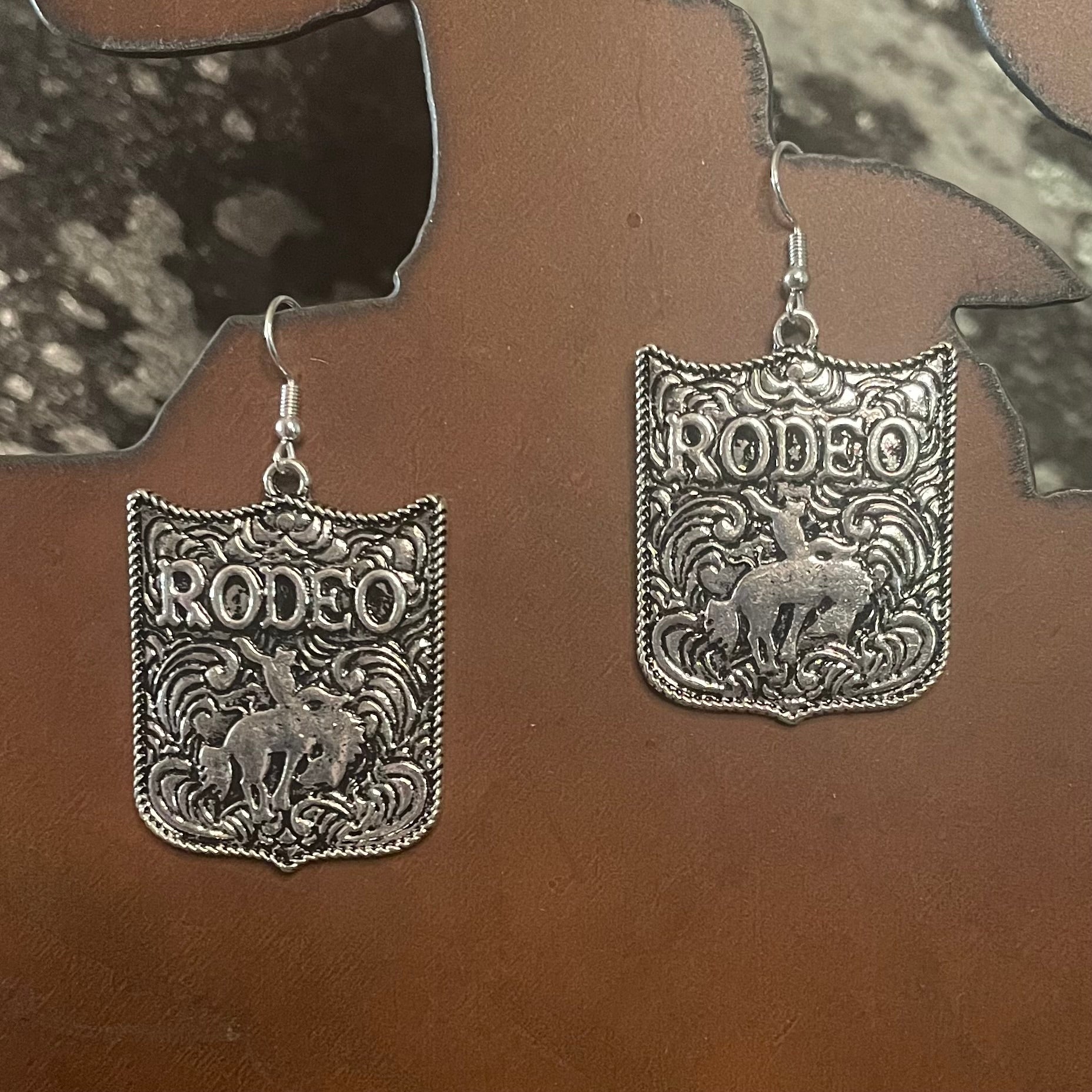 Silver 'Rodeo' themed earrings